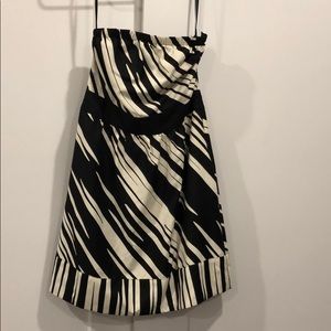 Cream an black dress. Excellent condition.